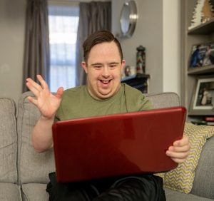 Image of man enjoying LifeRing recovery meeting for those with diabilities.