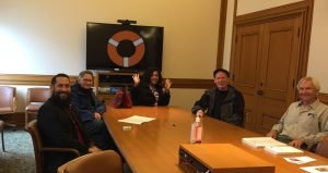 image of LifeRing participants in SF City Hall in-person meeting